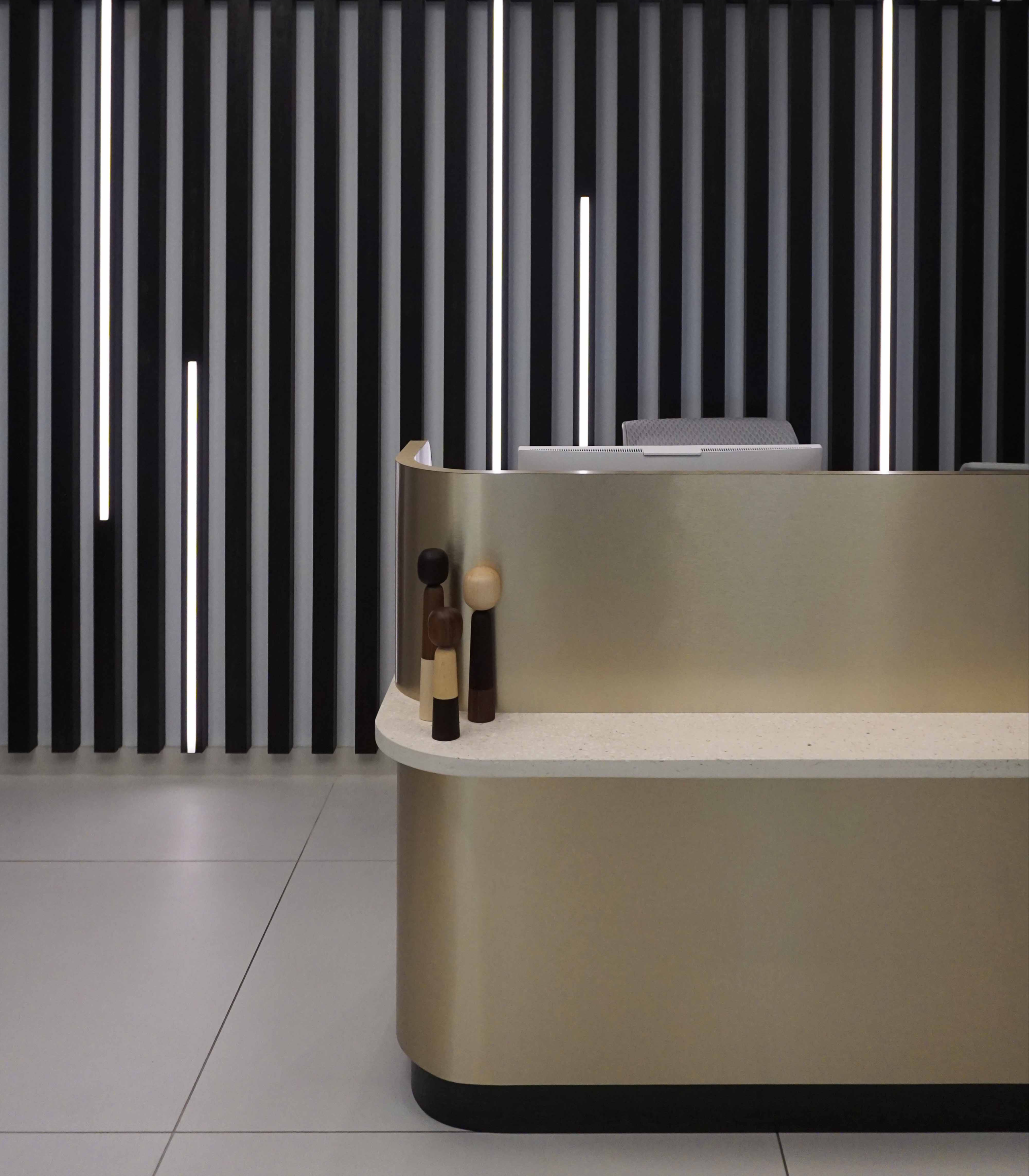 a recycled shell reception desk in a room