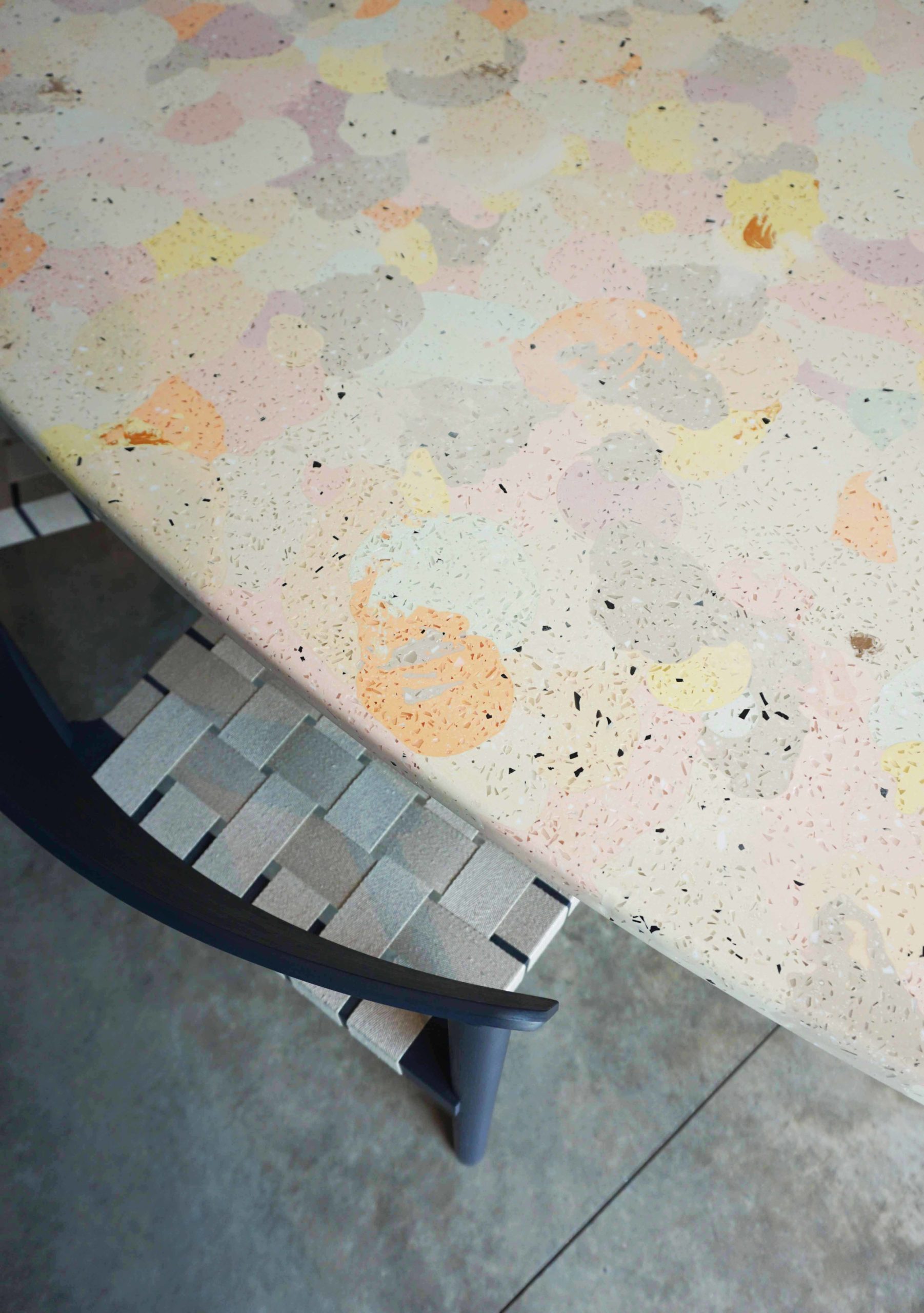 a recycled plastic table with a chair