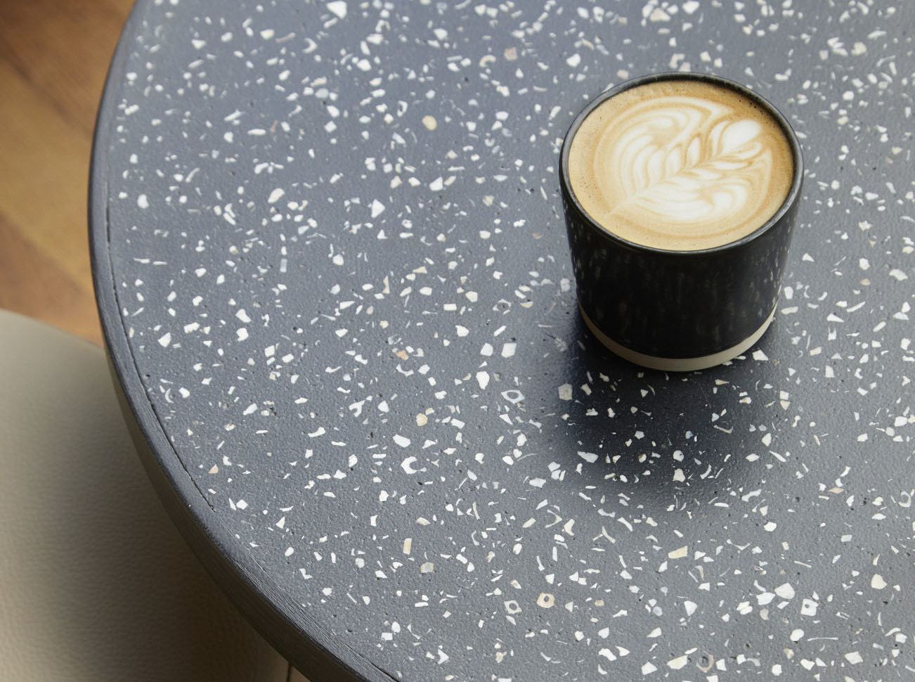Circular Design at Tate Modern- Close up of Table made with Coffee and shell by Spared