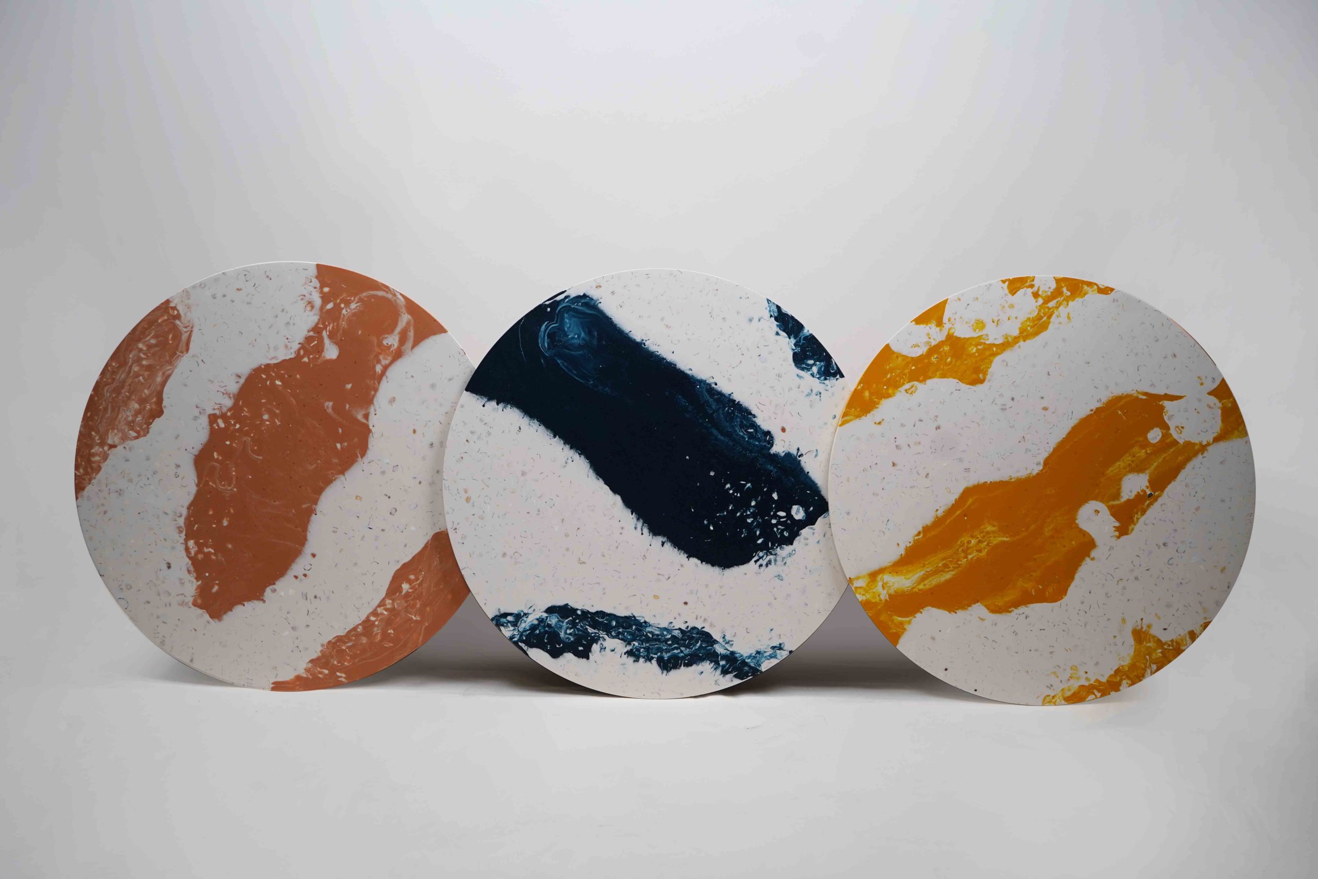 a group of custom recycled table tops